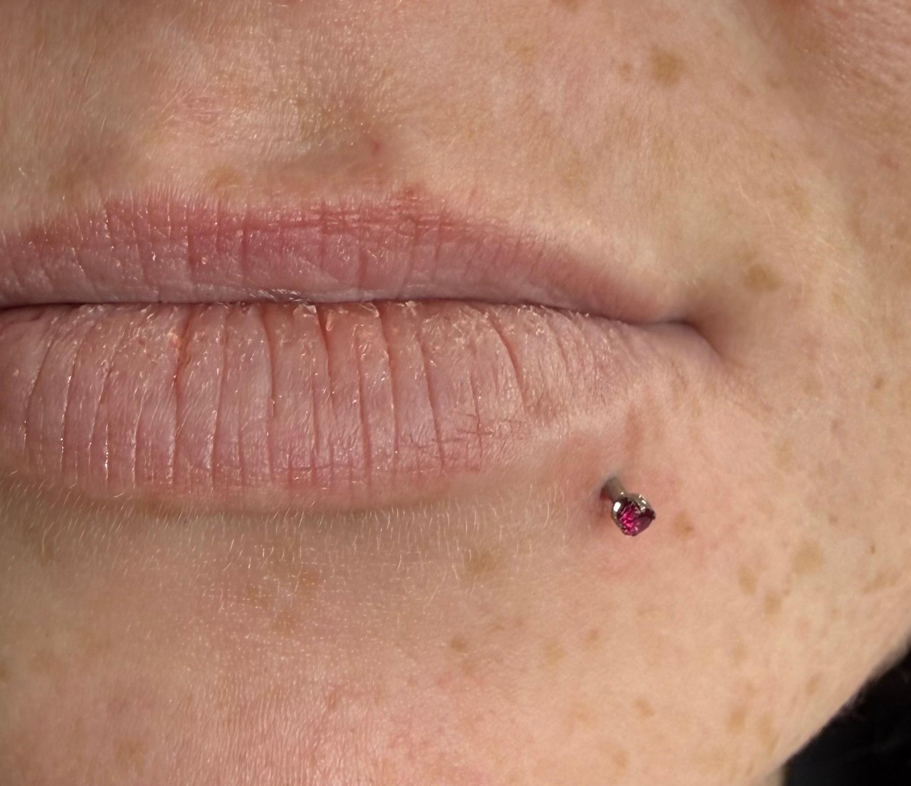 Lower lip piercing