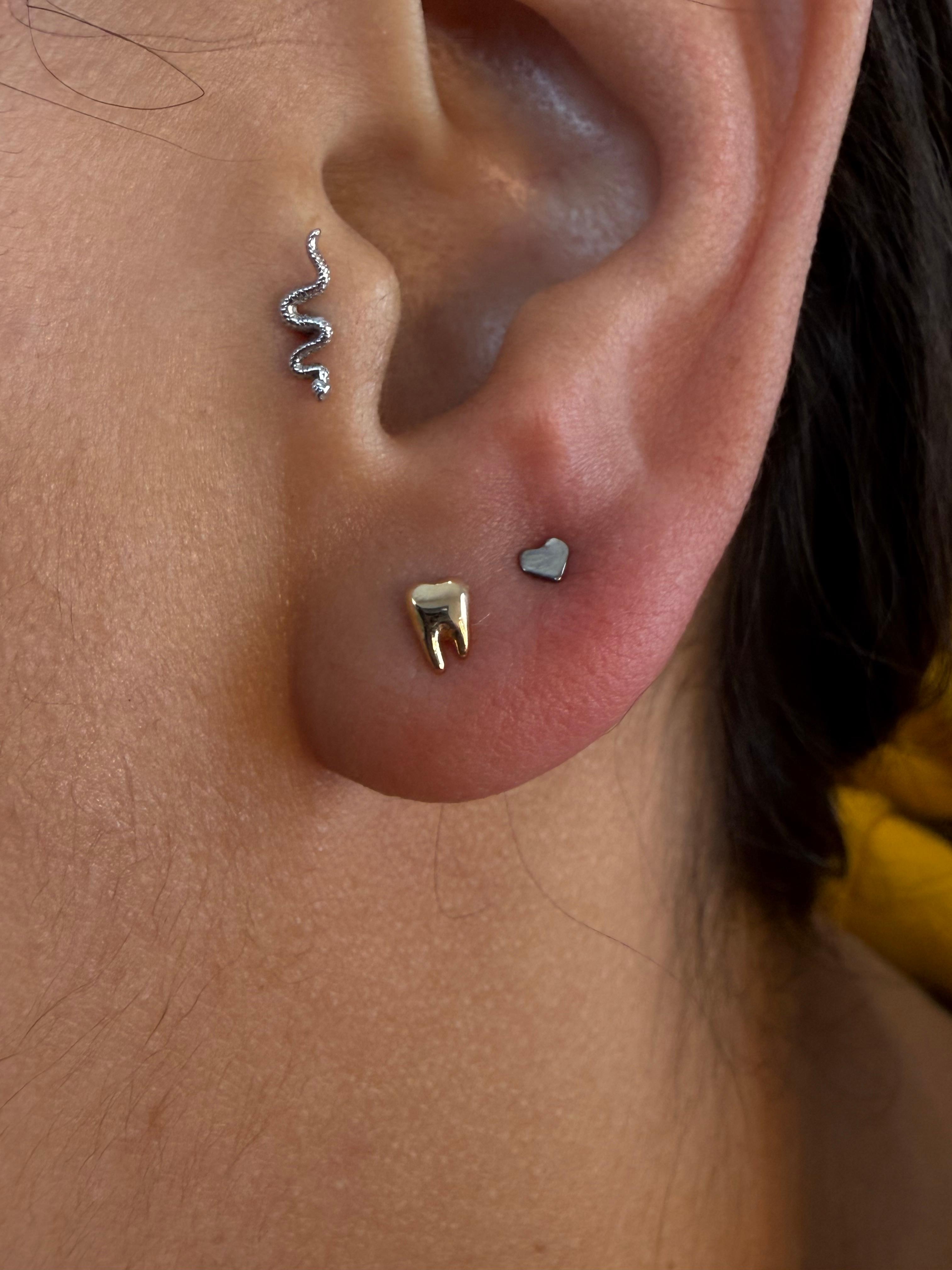 Lobe piercing(s)