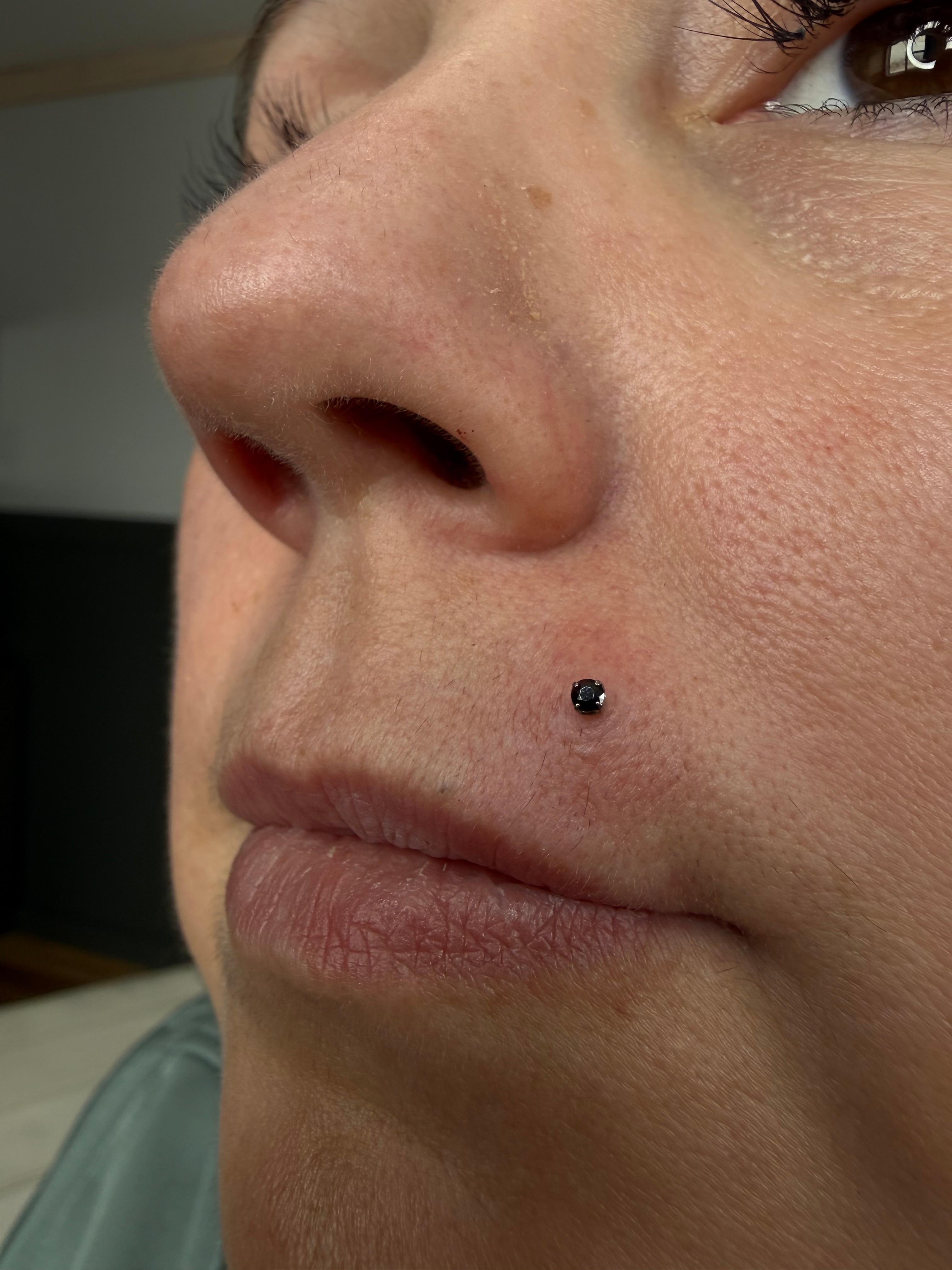 Upper lip piercing